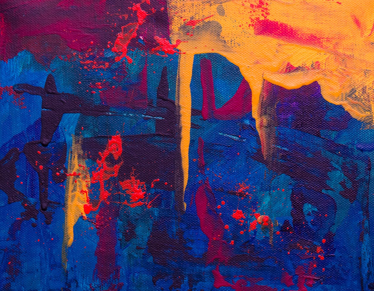 Colorful abstract painting with bold acrylic textures and vibrant hues.
